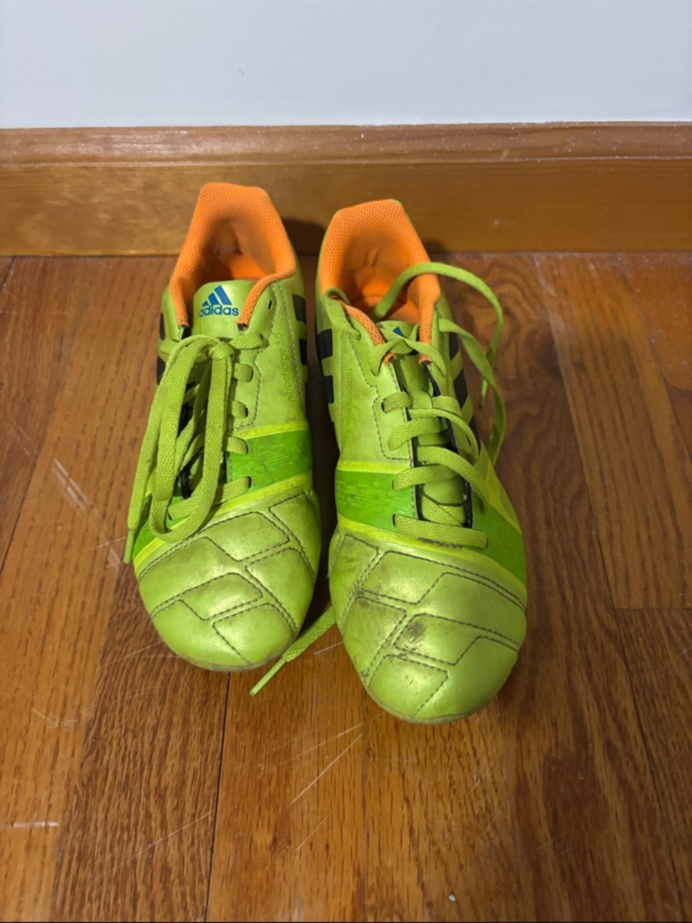 adidas Kids' Bright Lime Green Soccer Shoes with Orange Interior